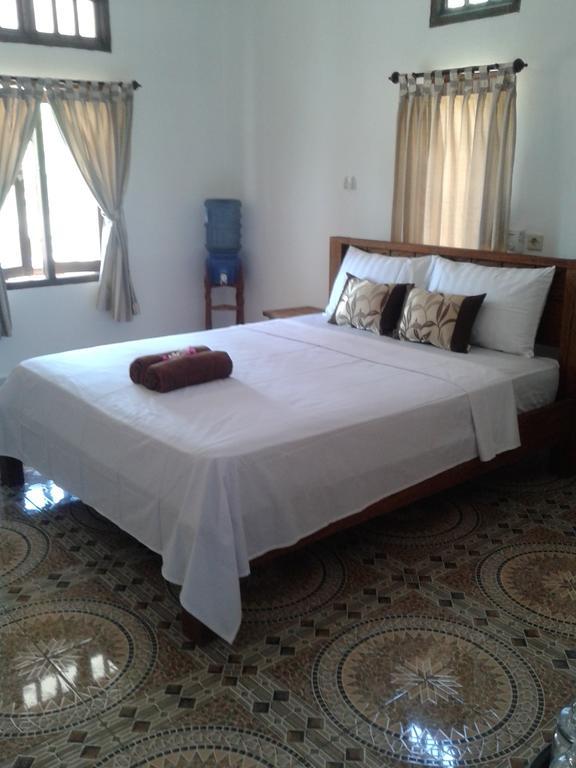 Putri Homestay Гили-Мено Номер фото