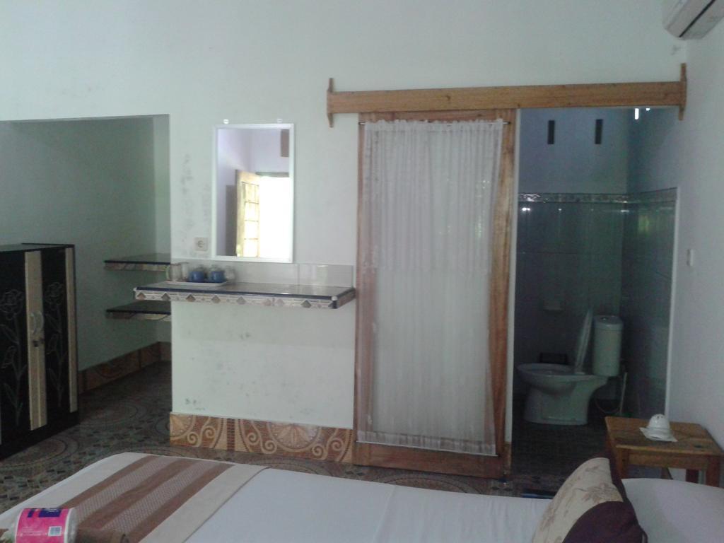 Putri Homestay Гили-Мено Экстерьер фото