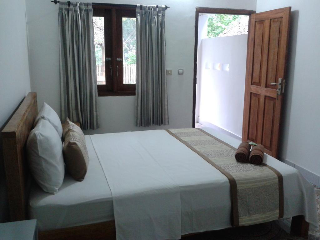 Putri Homestay Гили-Мено Экстерьер фото