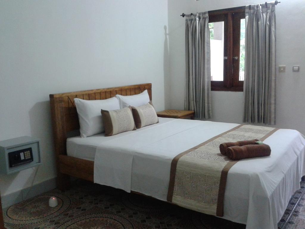 Putri Homestay Гили-Мено Номер фото
