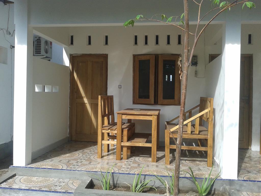 Putri Homestay Гили-Мено Номер фото