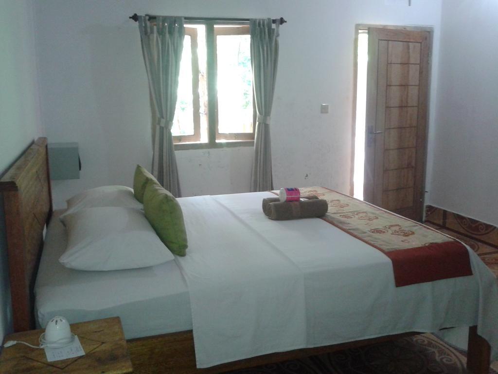 Putri Homestay Гили-Мено Экстерьер фото
