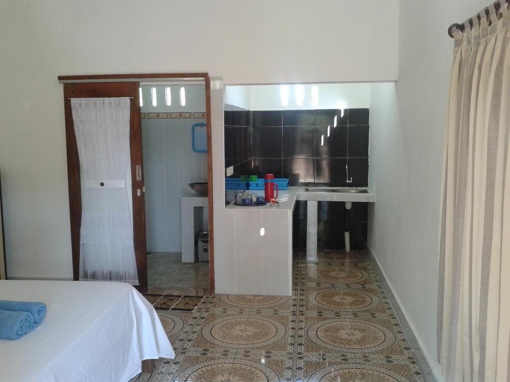 Putri Homestay Гили-Мено Номер фото