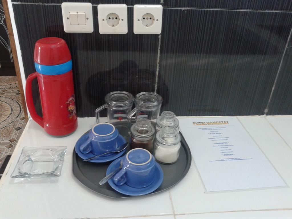 Putri Homestay Гили-Мено Номер фото