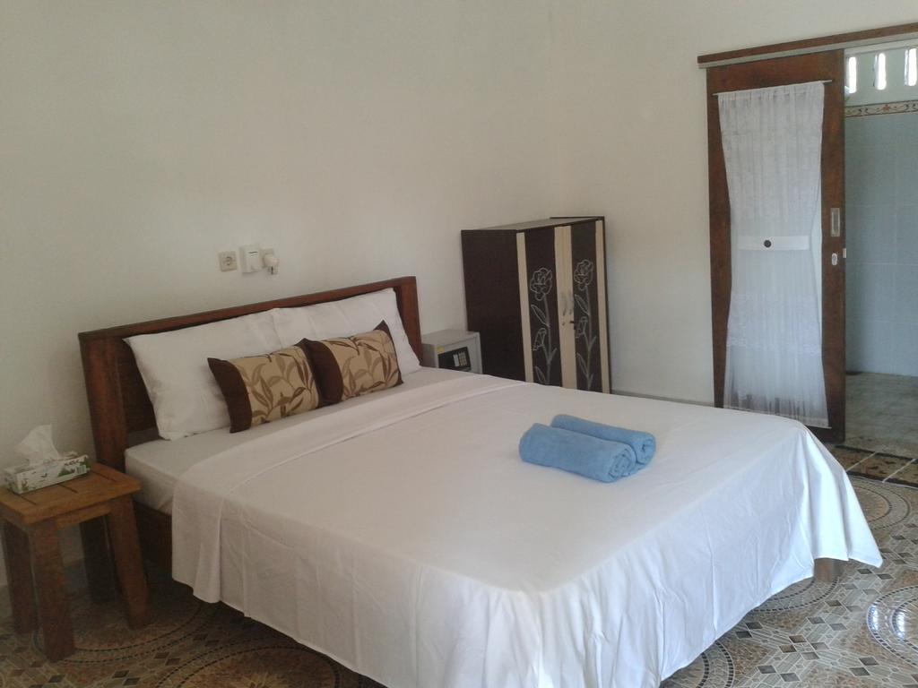 Putri Homestay Гили-Мено Номер фото