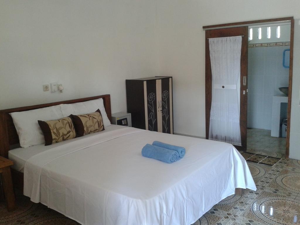 Putri Homestay Гили-Мено Номер фото