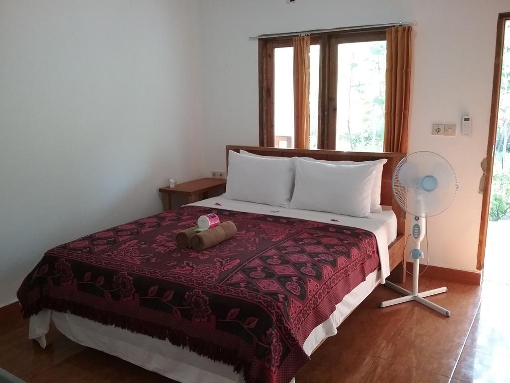Putri Homestay Гили-Мено Экстерьер фото