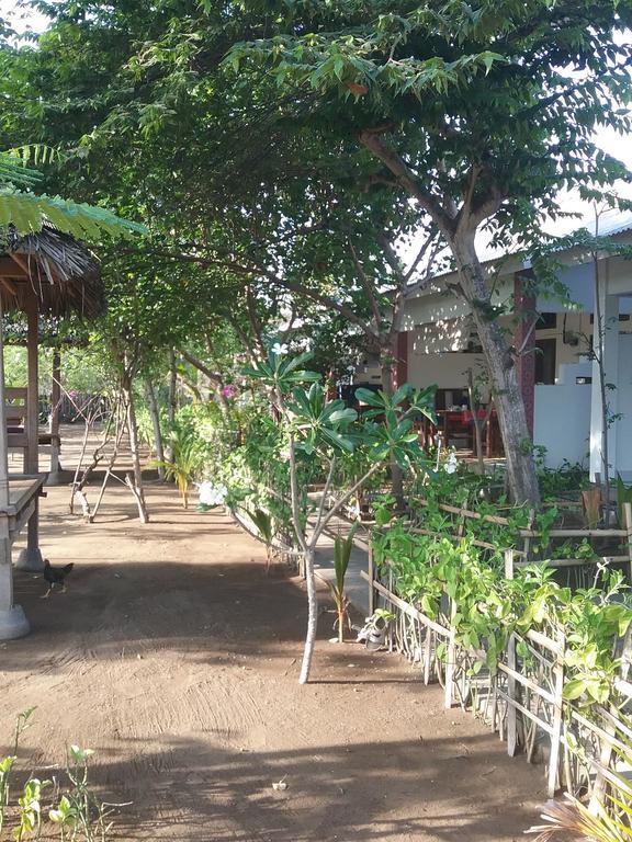 Putri Homestay Гили-Мено Экстерьер фото