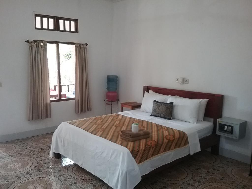 Putri Homestay Гили-Мено Экстерьер фото