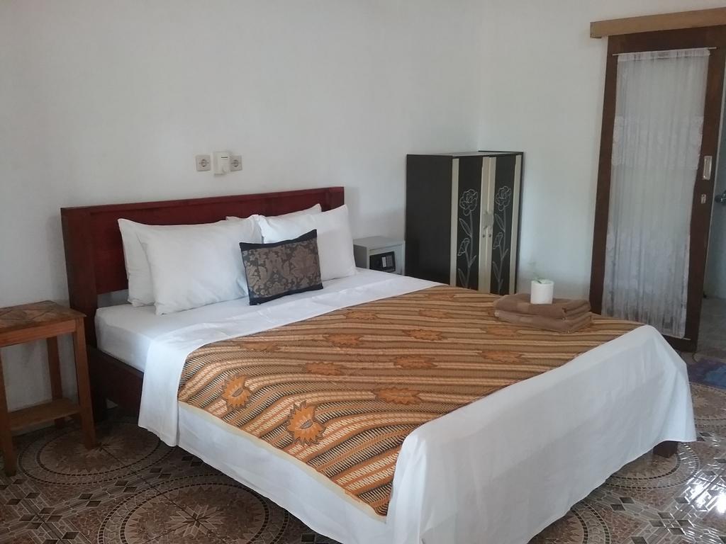 Putri Homestay Гили-Мено Экстерьер фото
