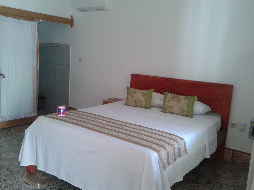 Putri Homestay Гили-Мено Экстерьер фото